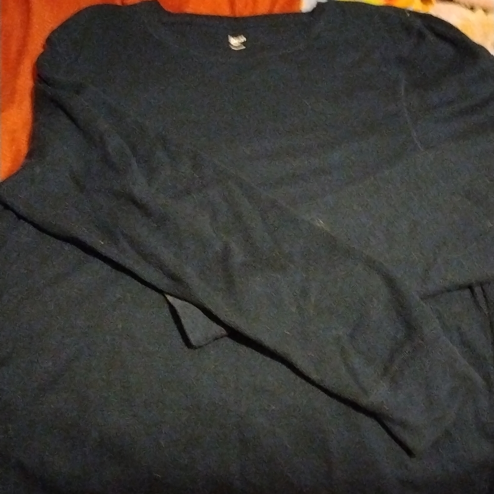 Dark blue long sleeve shirt bought for me I never put it on